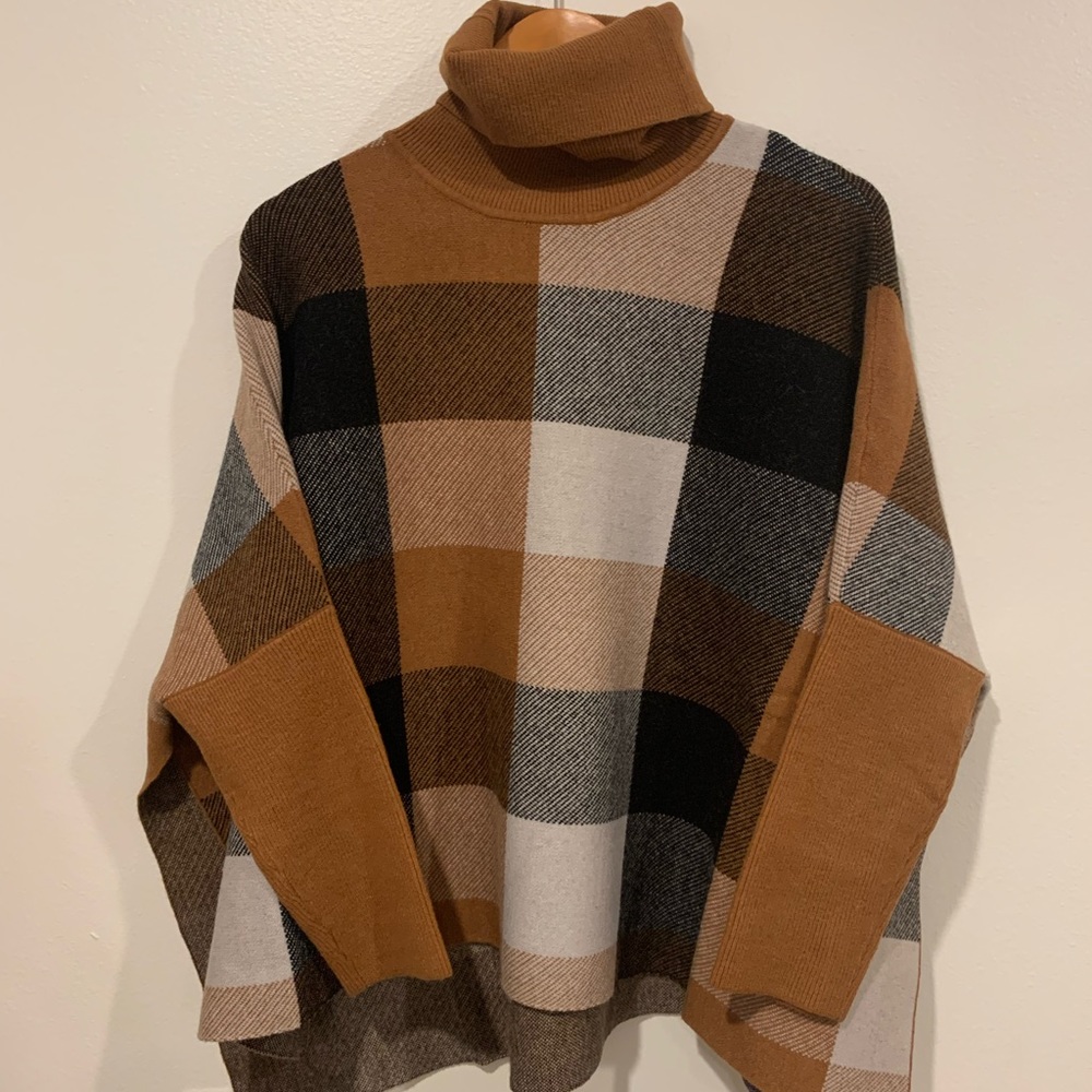 Our Beautiful plaid sweater Robyn is so soft and warm.